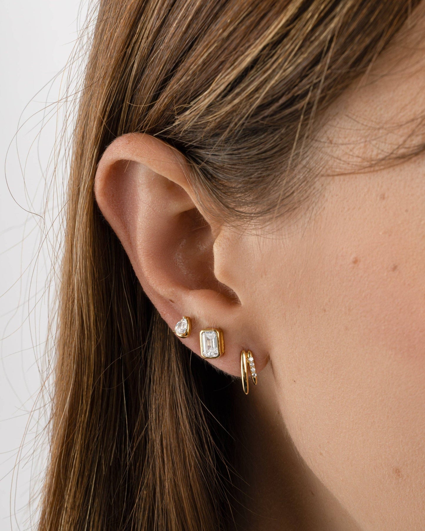 Emerald Cut Stud Earrings: Gold