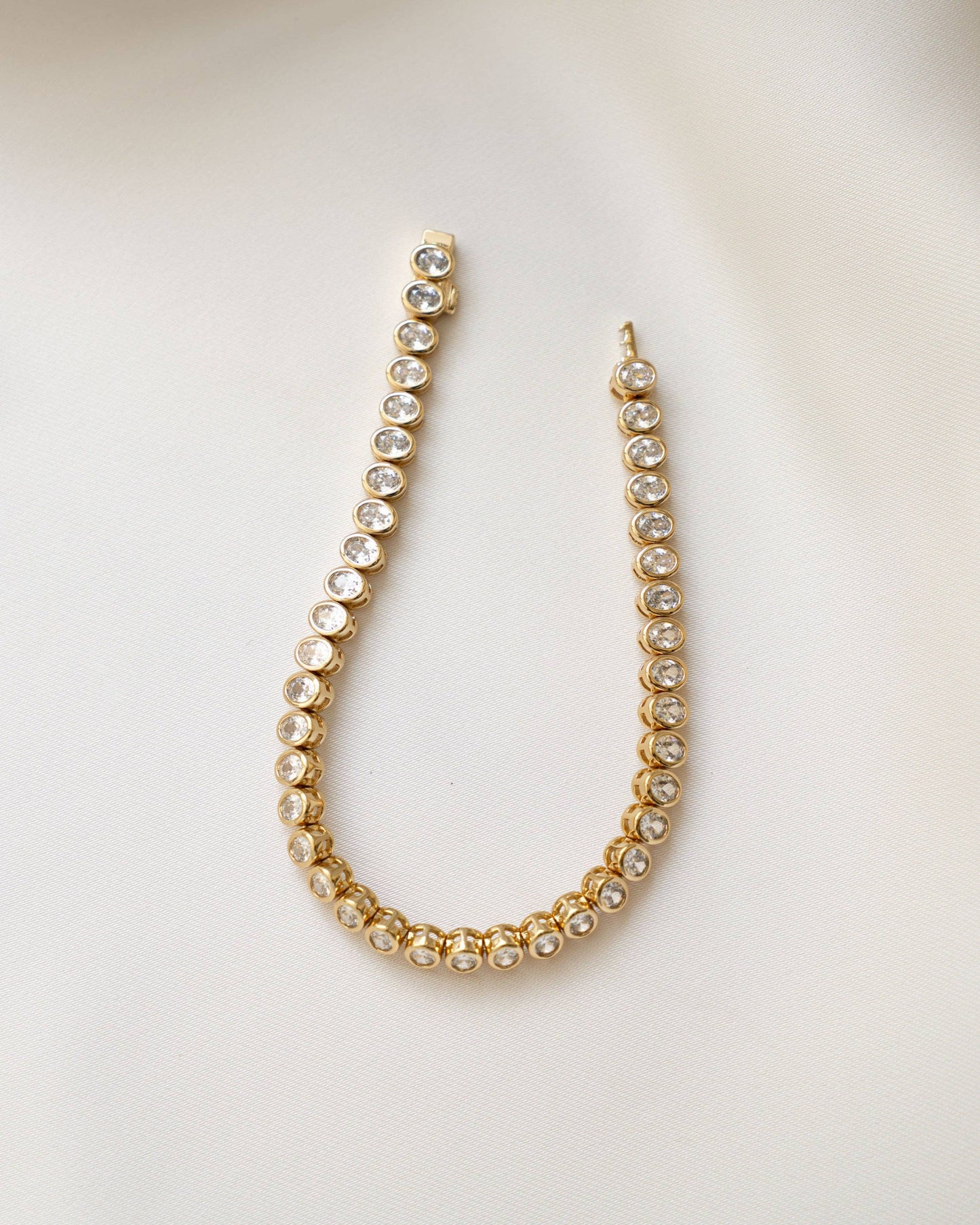 Oval Bezel Tennis Bracelet: Gold / 6.75"