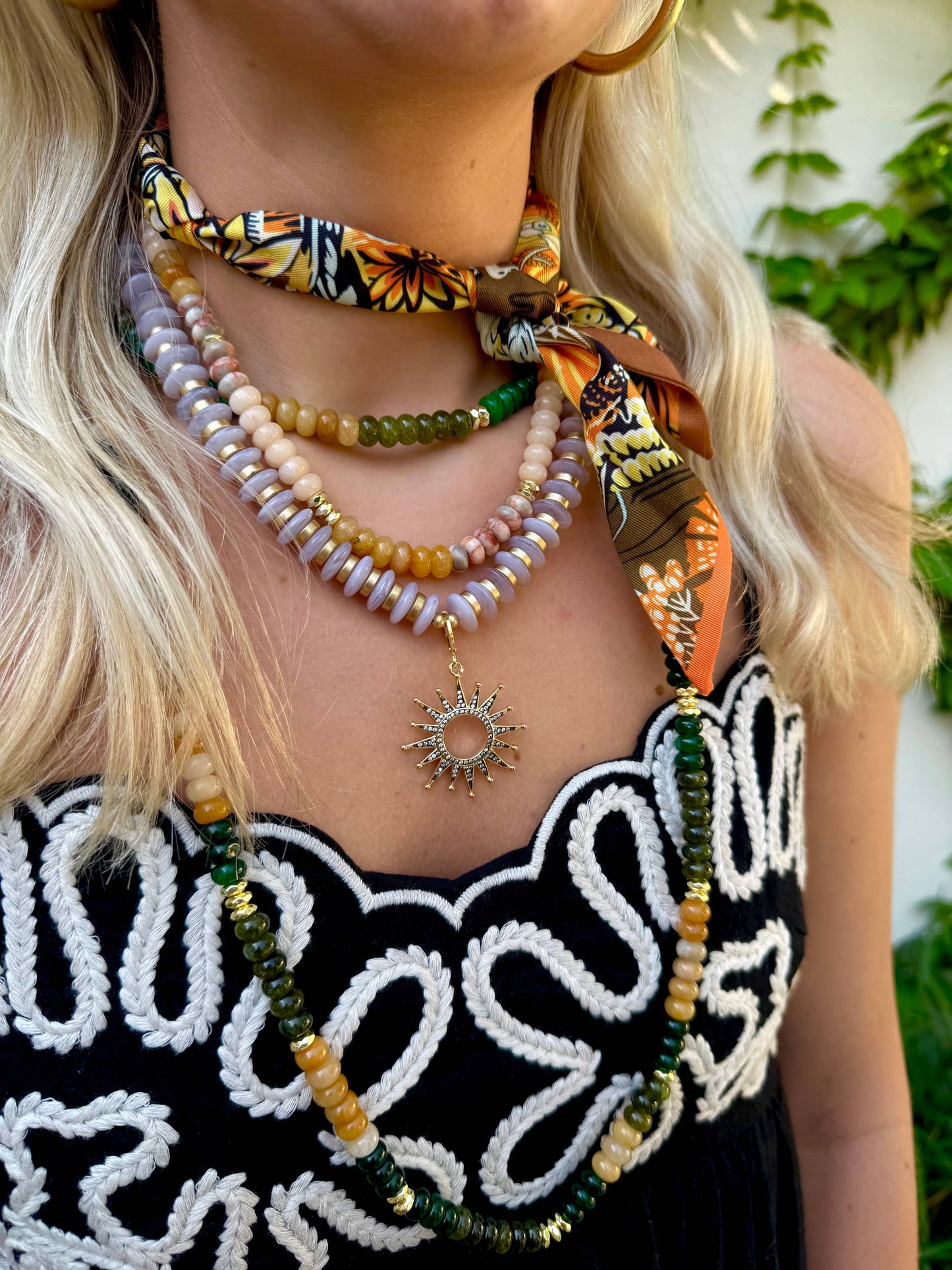Gail Taupe Beaded Necklace with Black Sun Charm
